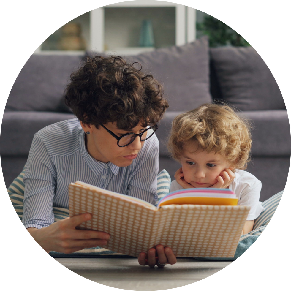Adult reading with kid